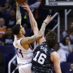 San Antonio Spurs center Pau Gasol (16) blocks the shot of Phoenix Suns guard Josh Gray, left, during the first half of an NBA basketball game Wednesday, Feb. 7, 2018, in Phoenix. (AP Photo/Ross D. Franklin)