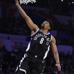 Brooklyn Nets' Spencer Dinwiddie shoots during the NBA All-Star basketball Skills Challenge, Saturday, Feb. 17, 2018, in Los Angeles. Dinwiddie won the event. (AP Photo/Chris Pizzello)