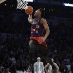 Utah Jazz's Donovan Mitchell competes in the NBA basketball All-Star weekend slam dunk contest Saturday, Feb. 17, 2018, in Los Angeles. Mitchell won the event. (AP Photo/Chris Pizzello)