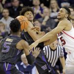 Washington's Jaylen Nowell, left, and Matisse Thybulle and Arizona's Keanu Pinder, right, watch the ball during the second half of an NCAA college basketball game Saturday, Feb. 3, 2018, in Seattle. Washington won 78-75. (AP Photo/John Froschauer)