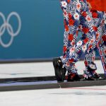 Norway's Torger Nergaard, right, and Christoffer Svae stand during a men's curling match against Canada at the 2018 Winter Olympics in Gangneung, South Korea, Thursday, Feb. 15, 2018. (AP Photo/Natacha Pisarenko)