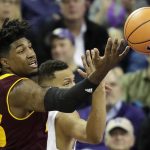 Arizona State forward Romello White, left, reaches for a rebound with Washington forward Dominic Green, right, in the first half of an NCAA college basketball game, Thursday, Feb. 1, 2018, in Seattle. (AP Photo/Ted S. Warren)