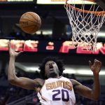 Phoenix Suns forward Josh Jackson looks to grab a defensive rebound during the first half of an NBA basketball game against the Los Angeles Clippers, Friday, Feb. 23, 2018, in Phoenix. (AP Photo/Ralph Freso)
