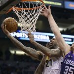 Denver Nuggets forward Wilson Chandler (21) drives to the basket as Phoenix Suns' Dragan Bender (35) defends during the second half of an NBA basketball game Saturday, Feb. 10, 2018, in Phoenix. (AP Photo/Ralph Freso)