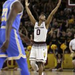 Arizona State guard Tra Holder (0) reacts after scoring against UCLA in the second half during an NCAA college basketball game, Saturday, Feb. 10, 2018, in Tempe, Ariz. Arizona State defeated UCLA 88-79. (AP Photo/Rick Scuteri)