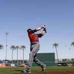 Arizona Diamondbacks' Nick Ahmed takes a practice swing as he waits to bat prior to a spring training baseball game against the Cincinnati Reds Monday, Feb. 26, 2018, in Goodyear, Ariz. (AP Photo/Ross D. Franklin)