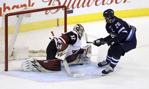 Arizona Coyotes' goaltender Antti Raanta (32) stops Winnipeg Jets' Blake Wheeler (26) during third ...