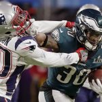 Philadelphia Eagles running back Corey Clement (30), right, runs against New England Patriots strong safety Duron Harmon (30), during the first half of the NFL Super Bowl 52 football game, Sunday, Feb. 4, 2018, in Minneapolis. (AP Photo/Tony Gutierrez)