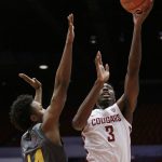 Washington State forward Robert Franks (3) shoots over Arizona State forward Kimani Lawrence (14) during the first half of an NCAA college basketball game in Pullman, Wash., Sunday, Feb. 4, 2018. (AP Photo/Young Kwak)