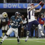 New England Patriots' Chris Hogan catches a touchdown pass during the second half of the NFL Super Bowl 52 football game against the Philadelphia Eagles Sunday, Feb. 4, 2018, in Minneapolis. (AP Photo/Mark Humphrey)