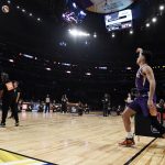 Phoenix Suns' Devin Booker watches a shot during the NBA basketball All-Star weekend 3-Point contest Saturday, Feb. 17, 2018, in Los Angeles. Booker won the event. (AP Photo/Chris Pizzello)