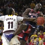 Arizona guard Rawle Alkins (1) is fouled by Arizona State guard Shannon Evans II during the first half during an NCAA college basketball game Thursday, Feb. 15, 2018, in Tempe, Ariz. (AP Photo/Rick Scuteri)