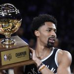 Brooklyn Nets' Spencer Dinwiddie holds up his trophy after winning the NBA All-Star basketball Skills Challenge, Saturday, Feb. 17, 2018, in Los Angeles.
 (AP Photo/Chris Pizzello)