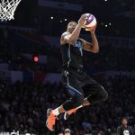 Dallas Mavericks' Dennis Smith Jr. competes in the slam dunk contest, part of the NBA basketball All-Star weekend, Saturday, Feb. 17, 2018, in Los Angeles. (AP Photo/Chris Pizzello)
