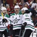 Dallas Stars center Tyler Seguin (91) celebrates his goal against the Arizona Coyotes with defenseman John Klingberg (3), center Devin Shore (17), right wing Alexander Radulov (47), and left wing Jamie Benn, right, during the second period of an NHL hockey game Thursday, Feb. 1, 2018, in Glendale, Ariz. (AP Photo/Ross D. Franklin)
