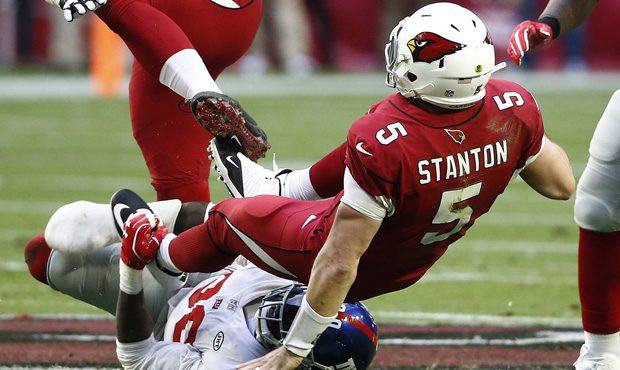 Arizona Cardinals quarterback Drew Stanton (5) is sacked by New York Giants defensive tackle Jay Br...