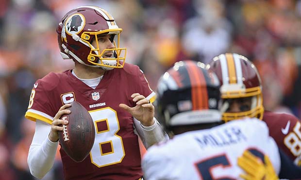 Washington Redskins quarterback Kirk Cousins (8) steps back to pass during the first half an NFL fo...