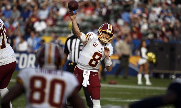 Washington Redskins quarterback Kirk Cousins (8) throws a pass during the first half of an NFL foot...