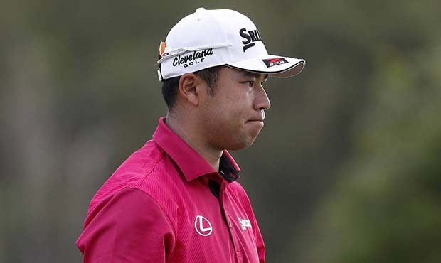Hideki Matsuyama acknowledges the gallery on the 17th green during the first round of the Tournamen...