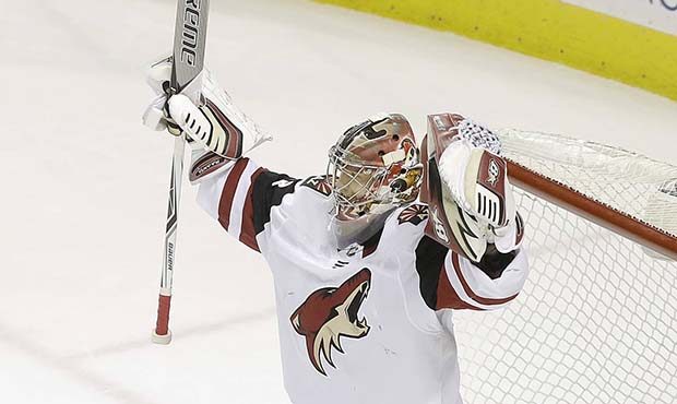 Arizona Coyotes goaltender Antti Raanta, from Finland, celebrates after the Coyotes defeated the Sa...
