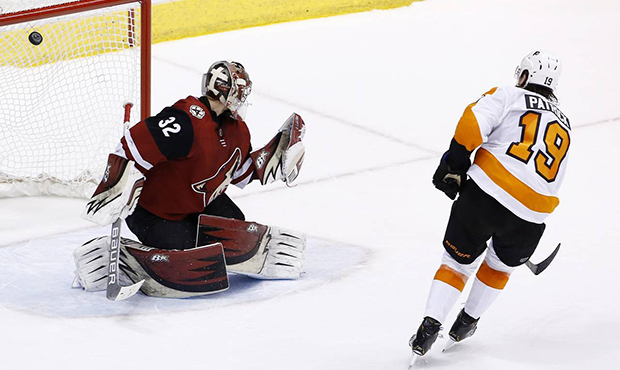 Philadelphia Flyers center Nolan Patrick (19) scores the winning goal against Arizona Coyotes goalt...
