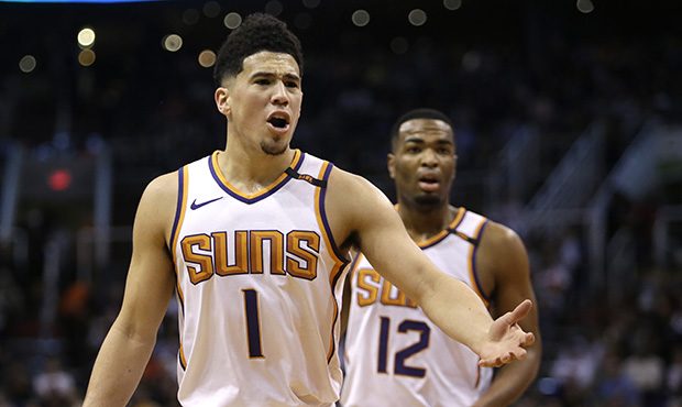 Phoenix Suns guard Devin Booker (1) in the second half during an NBA basketball game against the Cl...