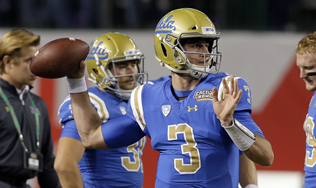 UCLA quarterback Josh Rosen warms up before an NCAA college football bowl game against Kansas State...