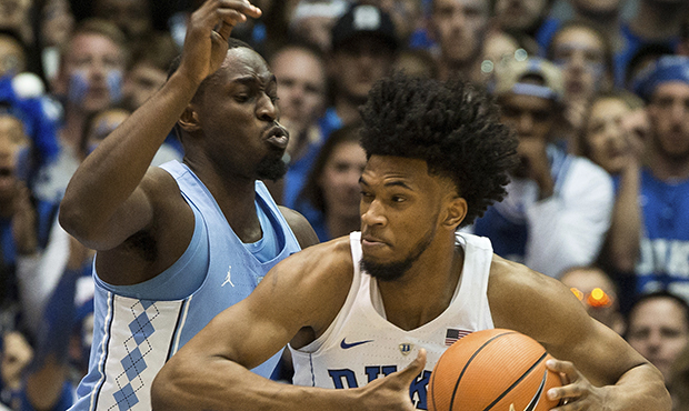 Duke's Marvin Bagley III (35) works against North Carolina's Theo Pinson during the second half of ...