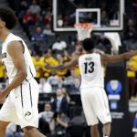 Colorado's D'Shawn Schwartz, left, and Namon Wright react after a 3-point shot during the second half of an NCAA college basketball game against Arizona State in the first round of the Pac-12 men's tournament Wednesday, March 7, 2018, in Las Vegas. Colorado defeated Arizona State 97-85. (AP Photo/Isaac Brekken)