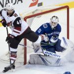 Arizona Coyotes left wing Jordan Martinook (48) fails to get a shot on Vancouver Canucks goaltender Jacob Markstrom (25) during the second period of an NHL hockey game Wednesday, March 7, 2018, in Vancouver, British Columbia. (Jonathan Hayward/The Canadian Press via AP)