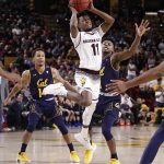 Arizona State guard Shannon Evans II (11) looks to pass as California guards Don Coleman (14) and Darius McNeill defend during the second half of an NCAA college basketball game Thursday, March 1, 2018, in Tempe, Ariz. (AP Photo/Matt York)