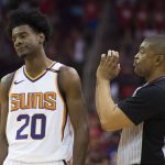 Phoenix Suns guard Josh Jackson, left, reacts as referee Tony Brothers, right, explains a foul call against the Houston Rockets in the first half of an NBA basketball game Friday, March 30, 2018, in Houston. (AP Photo/George Bridges)