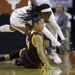 Texas guard Lashann Higgs, back, and Arizona State guard Kiara Russell (4) scramble for a loose ball during a second-round game in the NCAA women's college basketball tournament, Monday, March 19, 2018, in Austin, Texas. (AP Photo/Eric Gay)