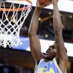 UCLA's Kris Wilkes dunks during the first half of the team's NCAA college basketball game against Arizona in the semifinals of the Pac-12 men's tournament Friday, March 9, 2018, in Las Vegas. (AP Photo/Isaac Brekken)