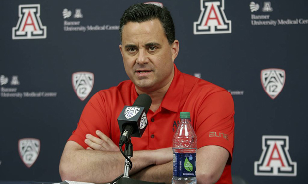 Arizona NCAA college basketball coach Sean Miller speaks at a press conference in Tucson, Ariz., Th...