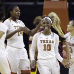Texas guard Lashann Higgs (10) celebrates a score with teammates Alecia Sutton (1), Olamide Aborowa (14) and Brooke McCarty (11) during a second-round game in the NCAA women's college basketball tournament against Arizona State, Monday, March 19, 2018, in Austin, Texas. (AP Photo/Eric Gay)