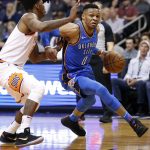 Oklahoma City Thunder guard Russell Westbrook (0) drives against Phoenix Suns guard Elfrid Payton during the first half of an NBA basketball game Friday, March 2, 2018, in Phoenix. (AP Photo/Matt York)