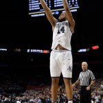 Villanova's Omari Spellman (14) shoots a 3-point basket against Kansas during the second half in the semifinals of the Final Four NCAA college basketball tournament, Saturday, March 31, 2018, in San Antonio. (AP Photo/David J. Phillip)