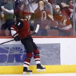 Arizona Coyotes center Clayton Keller celebrates his goal against the Minnesota Wild during the second period of an NHL hockey game Saturday, March 17, 2018, in Glendale, Ariz. (AP Photo/Ross D. Franklin)