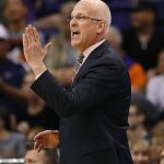 Phoenix Suns coach Jay Triano gestures to his team during the first half of an NBA basketball game against the Detroit Pistons on Tuesday, March 20, 2018, in Phoenix. (AP Photo/Matt York)