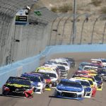 Monster Energy NASCAR Cup Series driver Martin Truex Jr. (78) leads the field on the green flag during a NASCAR Cup Series auto race on Sunday, March 11, 2018, in Avondale, Ariz. (AP Photo/Rick Scuteri)