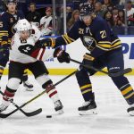Buffalo Sabres kyle Okposo (21) and Arizona Coyotes Josh Archibald (45) vie for the puck during the second period of an NHL hockey game Wednesday, March 21, 2018, in Buffalo, N.Y. (AP Photo/Jeffrey T. Barnes)