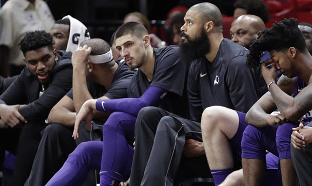 Phoenix Suns' Alex Len, third from left, Tyson Chandler and Elfrid Payton, right, sit on the bench ...