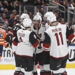 Arizona Coyotes players celebrate a goal against the Edmonton Oilers during first period NHL hockey action in Edmonton, Alberta, Monday, March 5, 2018. (Jason Franson/The Canadian Press via AP)