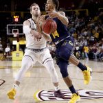 Arizona State forward Mickey Mitchell, left, knocks the ball loose from California guard Don Coleman (14) during the first half of an NCAA college basketball game Thursday, March 1, 2018, in Tempe, Ariz. (AP Photo/Matt York)