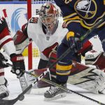 Arizona Coyotes goalie Antti Raanta (32) looks for the puck in traffic during the third period of the team's NHL hockey game against the Buffalo Sabres on Wednesday, March 21, 2018, in Buffalo, N.Y. (AP Photo/Jeffrey T. Barnes)