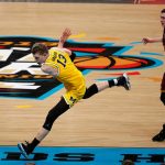 Michigan's Moritz Wagner (13) chases the loose ball during the second half in the semifinals of the Final Four NCAA college basketball tournament against Loyola-Chicago, Saturday, March 31, 2018, in San Antonio. (AP Photo/Brynn Anderson)