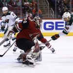 Minnesota Wild right wing Nino Niederreiter (22) scores a goal against Arizona Coyotes goaltender Antti Raanta (32) as Wild left wing Jason Zucker (16) looks on during the first period of an NHL hockey game Saturday, March 17, 2018, in Glendale, Ariz. (AP Photo/Ross D. Franklin)