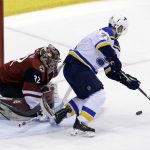 Arizona Coyotes goaltender Antti Raanta (32) makes the save on St. Louis Blues left wing Vladimir Sobotka in the third period during an NHL hockey game, Saturday, March 31, 2018, in Glendale, Ariz. (AP Photo/Rick Scuteri)