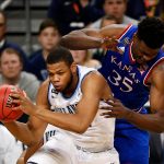 Villanova forward Omari Spellman, left, grabs a rebound in front of Kansas center Udoka Azubuike during the first half in the semifinals of the Final Four NCAA college basketball tournament, Saturday, March 31, 2018, in San Antonio. (AP Photo/Brynn Anderson)